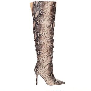 Thigh high snakeskin boots